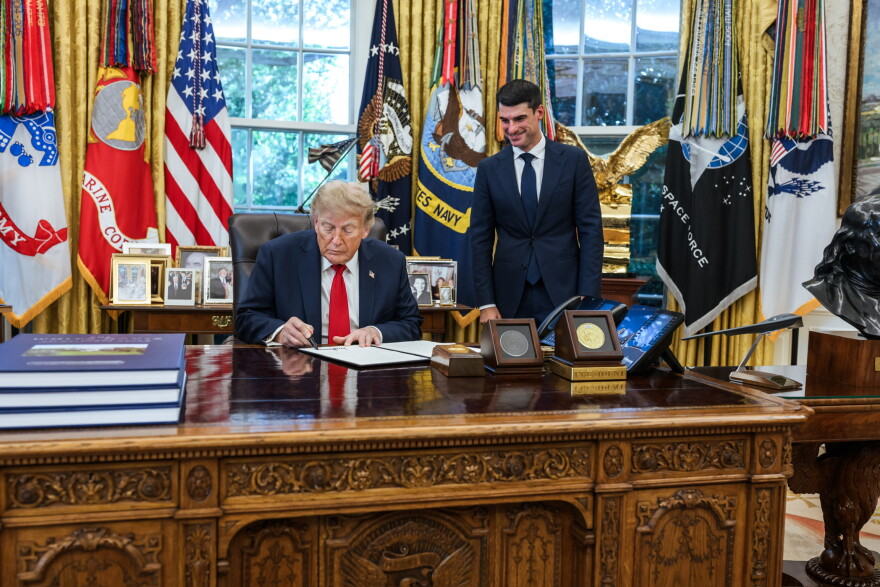 U.S. Representative Rob Bresnahan Jr. joins President Donald J. Trump as he signs an executive order reversing the Obama-era executive order that they say created the “rain tax."