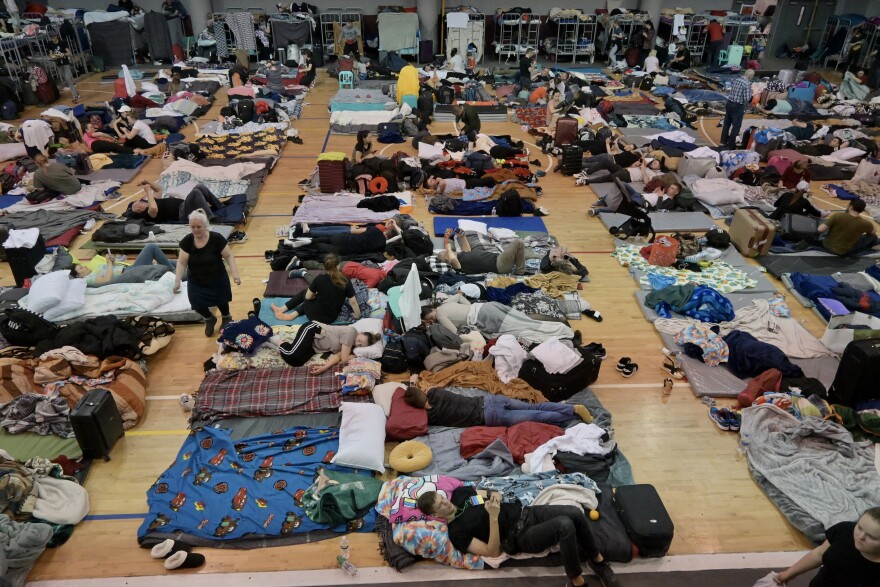 Volunteers worked with Tijuana officials to turn a municipal sports complex into a shelter to house thousands as they wait for their turn to be processed at the border.