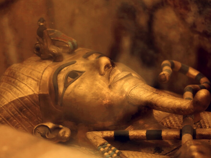 King Tutankhamun's golden sarcophagus displayed at his tomb in a glass case at the Valley of the Kings in Luxor, Egypt. New radar research published Sunday, indicates there are no hidden chambers in the tomb.