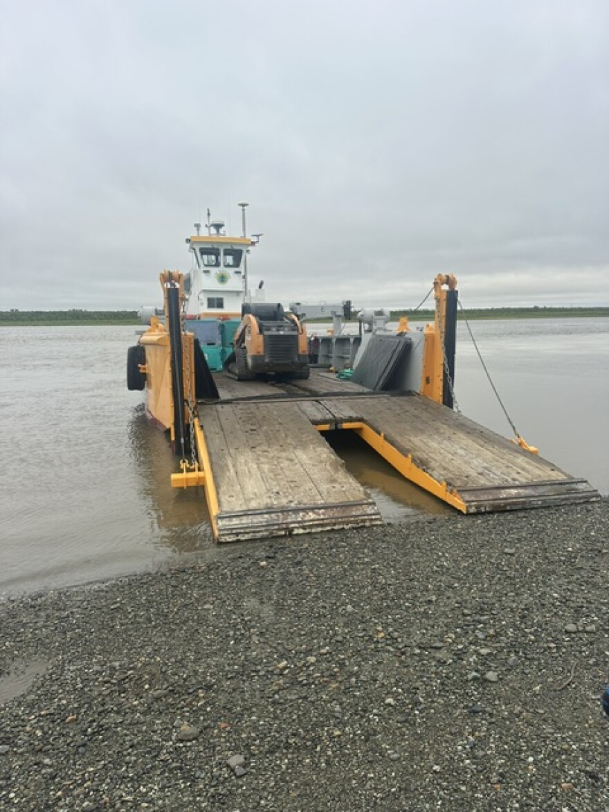 A barge operated by the Native Village of Napaimute offloads Kuskokwim Bay commercial-caught salmon in Bethel on July 27, 2026.