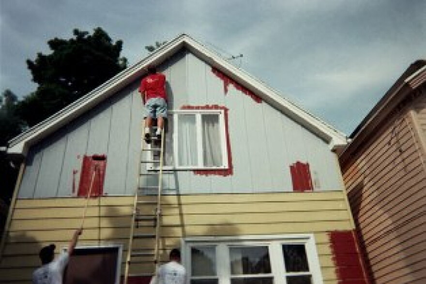 Brush Up Buffalo, June of 07, volunteers paint homes on the West Side along Plymouth Ave.