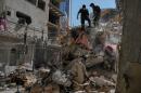 Lebanese civil defense workers inspect the rubble at the site of a building destroyed in an Israeli airstrike a day earlier in Beirut, Lebanon, Thursday, April 9, 2026. (Hussein Malla/AP)