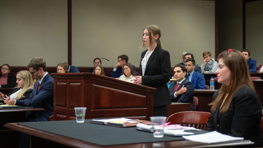 Law student presents case.