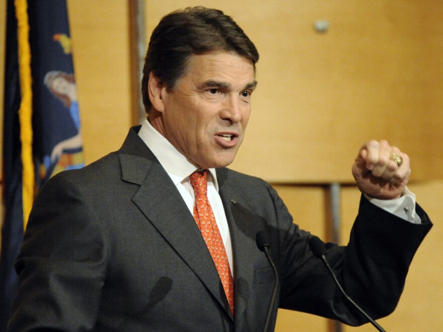 Texas Gov. Rick Perry speaks at a fundraising event for the New York GOP earlier this month. Some think he may be highlighting border security in anticipation of a run for the White House.