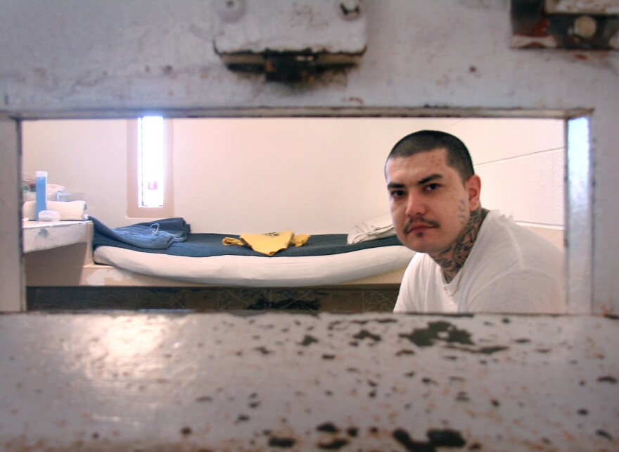 Nicklas Trujeque in his solitary confinement cell in New Mexico State Penitentiary. Inmates spend 23 hours a day in these cells, with a one-hour period in an open cell outside. According to the New Mexico ACLU, until recent state reforms, the average length of stay for an inmate here was around three years.