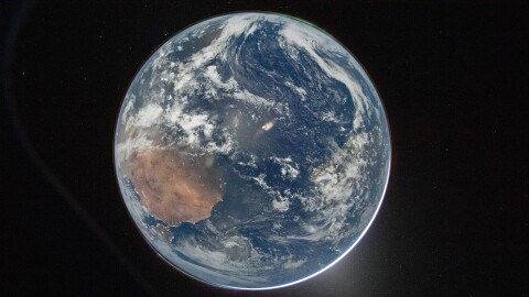 NASA astronaut and Artemis II Commander Reid Wiseman took this picture of Earth from the Orion spacecraft's window on April 2, 2026, after completing the translunar injection burn.