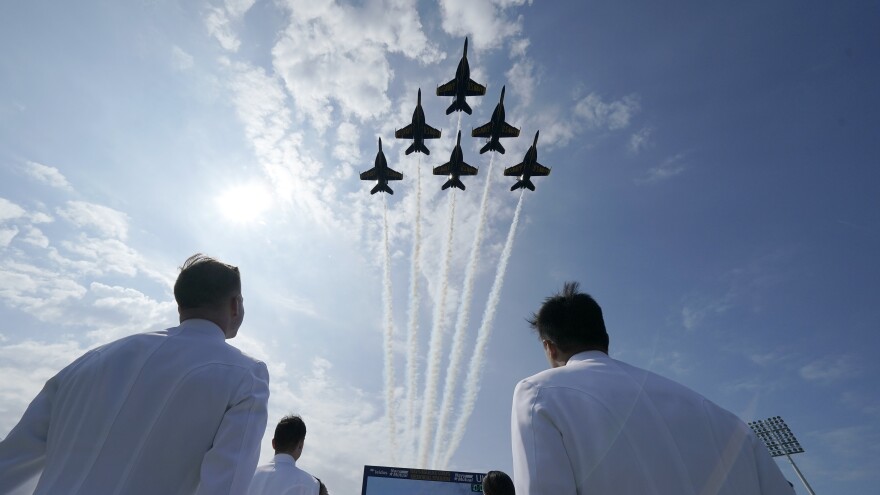 The Blue Angels fly over the graduation and commissioning ceremony at the U.S. Naval Academy in Annapolis, Md.