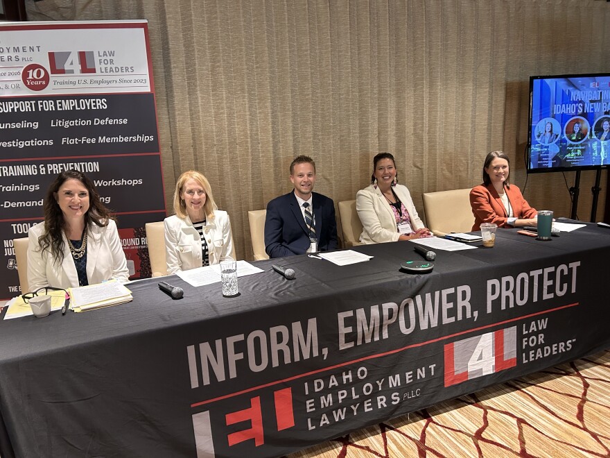 From left to right: Pam Howland, Jennifer Jones Hooft, Cody Earl, Megan Egbert, and Jennifer Walrath pose for a photos at a panel discussion Tuesday aimed at educating employers on how to respond to Idaho's bathroom bill.