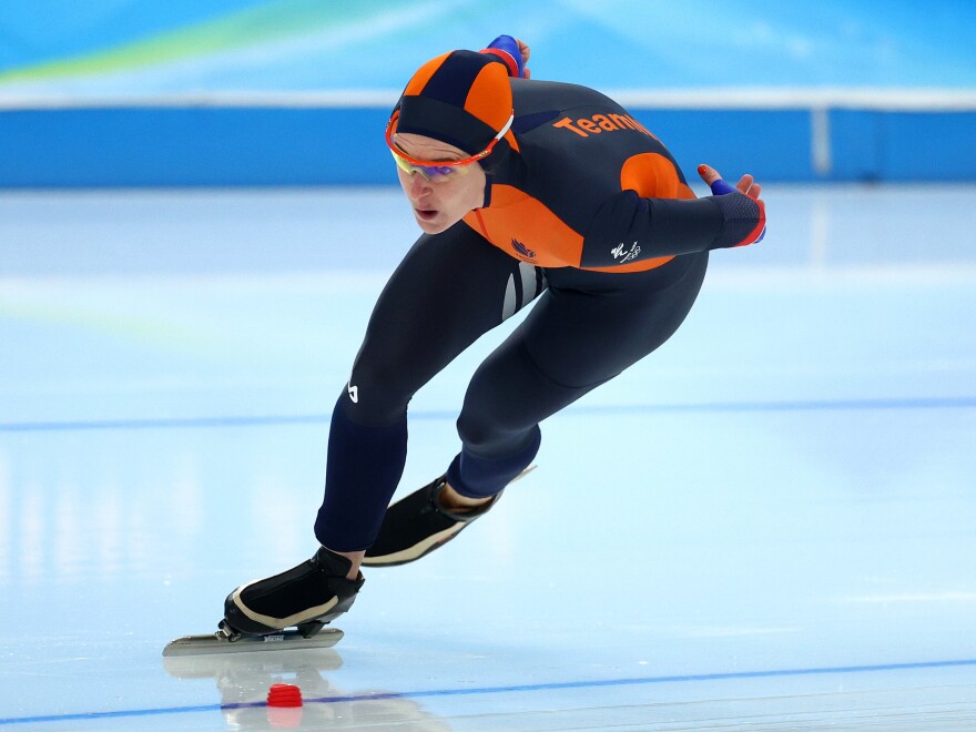 Ireen Wüst of Team Netherlands skates on her way to setting a new Olympic record in the women's 1,500 meters at the Beijing 2022 Winter Olympic Games.