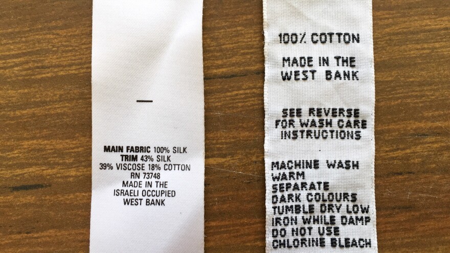 When the lingerie factory was operating, the U.S. said that West Bank products could be marked "Made in the Israeli Occupied West Bank" (left). European labels from that time marked Palestinian products "Made in the West Bank." The U.S. said that West Bank products could be marked "Made in the Israeli Occupied West Bank" (left). Old European labels say "Made in the West Bank."