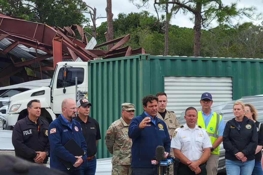 Gov. Ron DeSantis speaks Thursday afternoon in St. Lucie County, where tornadoes from Hurricane Milton killed at least five people, he said. (Chris Puorro/WUFT News)