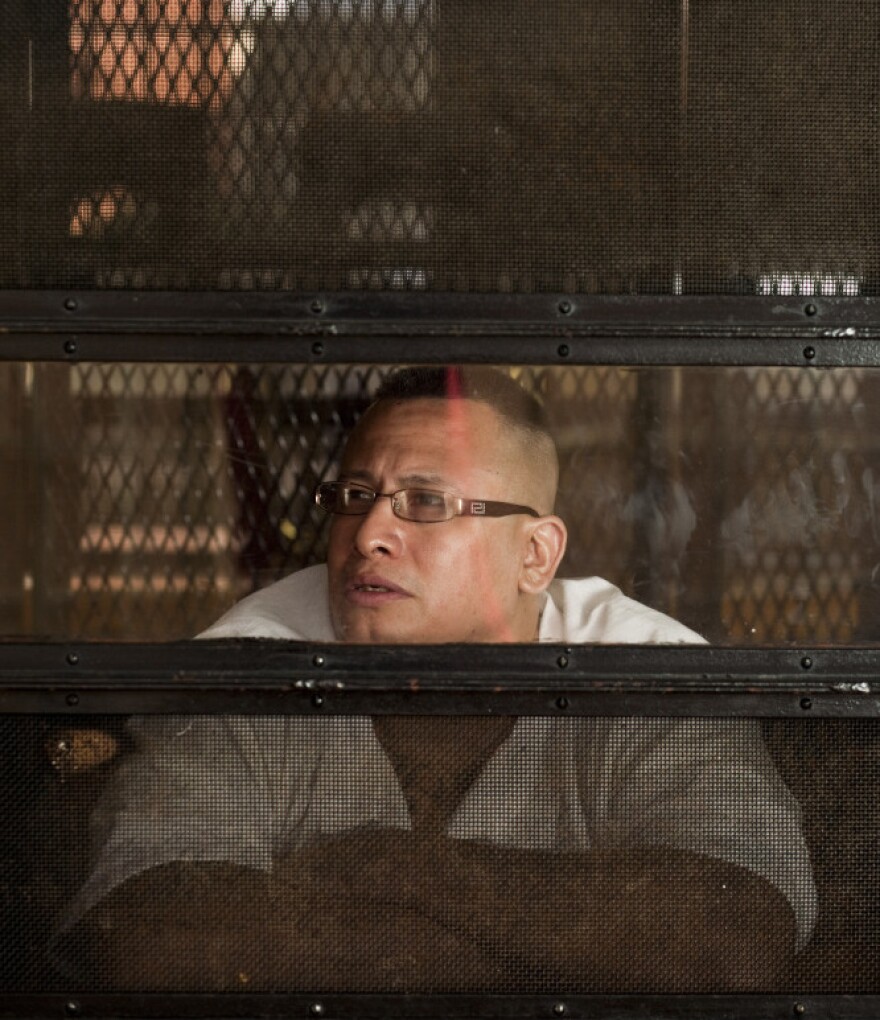 John Chris Hernandez listens to <em>The Prison Show</em> from his cell at the Eastham Unit penitentiary in East Texas. Hernandez is currently serving a life sentence for murder.