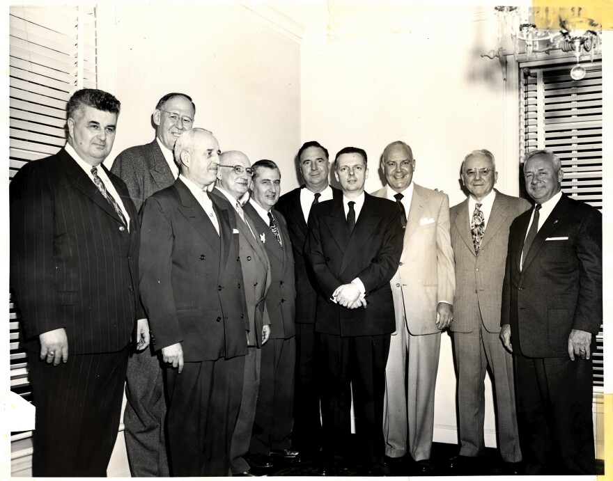 Orville Hodge, center, stands among top Illinois politicians. Among them, to Hodge's immediate right, is Illinois Governor William "Bill" Stratton, who served from 1953 to 1961.  
