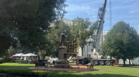 Scaffolding and a crane near the monument to Confederate General Stonewall Jackson outside the state capitol in Richmond.