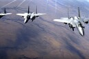 A group of U.S. Air Force F-15 aircraft flying in formation near Mountain Home Air Force Base, Idaho.