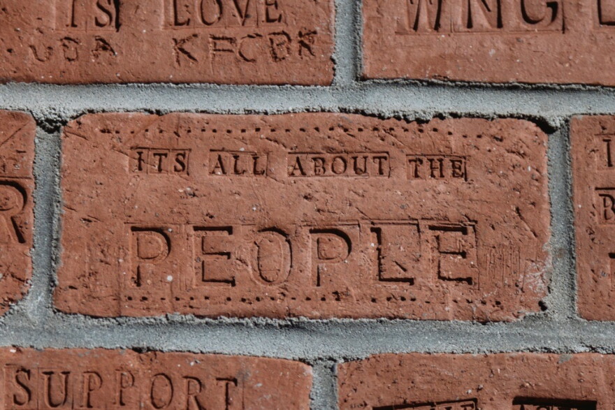 One of many bricks that makes up the new folk art piece at the Old Marshall Jail.