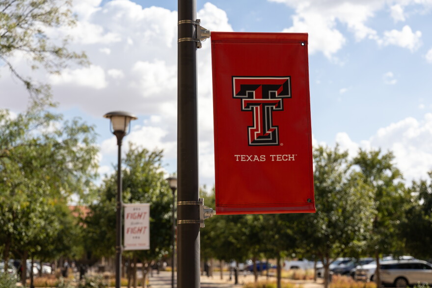 A Texas Tech University banner hangs from a light pole on the university's campus in Lubbock, Texas.