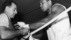 Angelo Dundee and boxer Cassius Clay (later Muhammad Ali), during a training session in 1966.