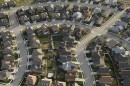 FILE - Homes in suburban Salt Lake City as seen from the air, April 13, 2019.