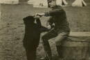 Canadian veterinarian and soldier Harry Colebourn with Winnie the bear cub. (Courtesy of Lindsay Mattick)