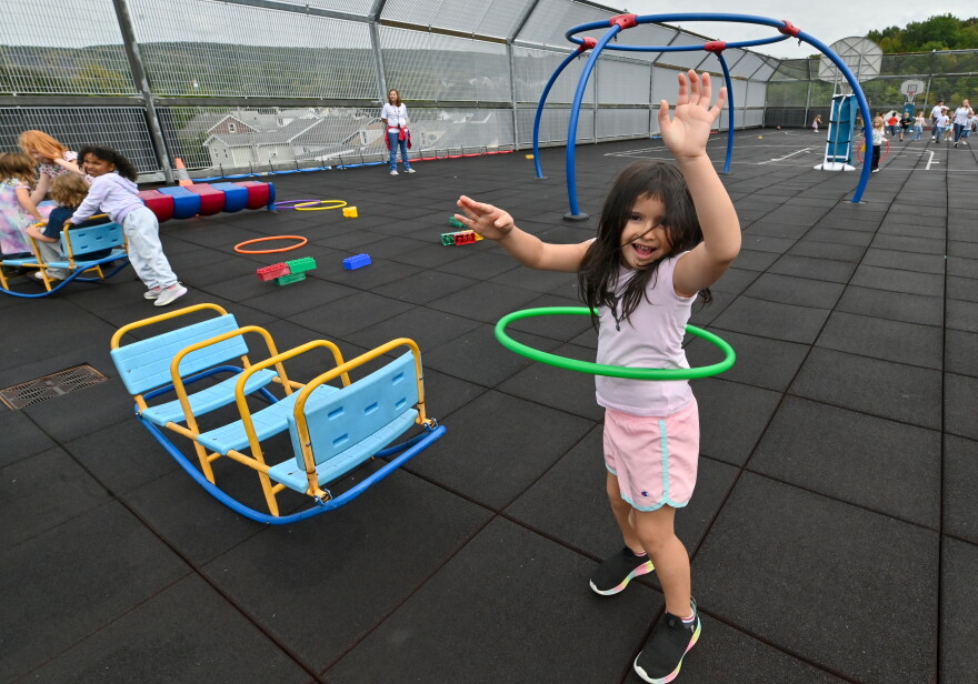 Legacy Morales hula hoops on the rooftop playground of the St. Clair Area School District.