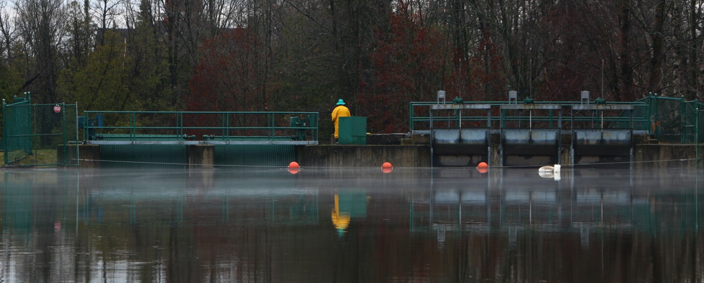Dam operator Leslie Meyers monitoring water levels at the Bellaire Dam. (Photo : Austin Rowlader/IPR News)