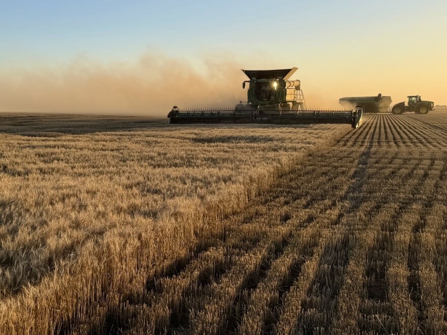 A combine rolls through a hard red winter wheat field in western Kansas during the latest harvest season.