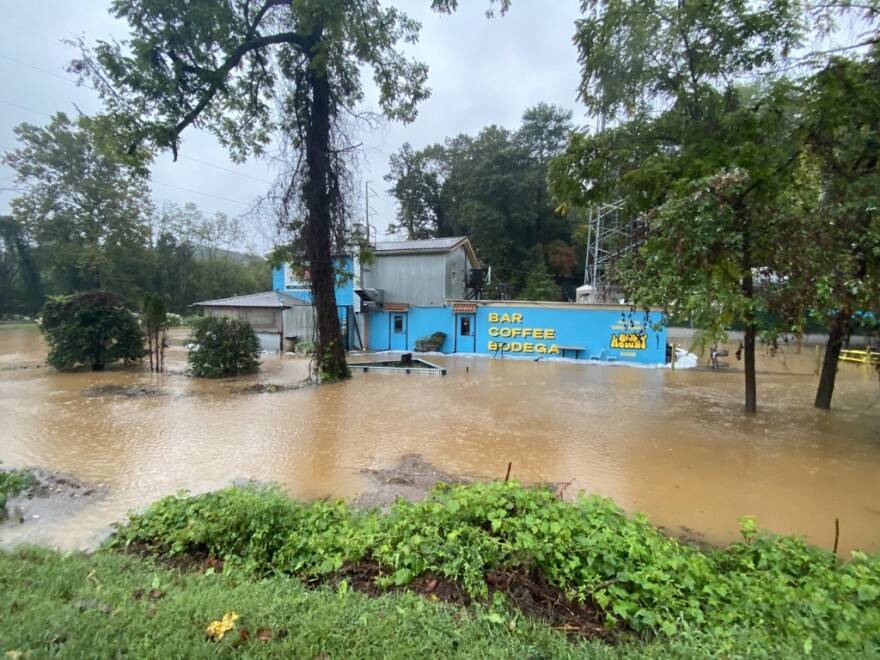 Severe flooding in Asheville on Sept. 26, 2024 at Day Trip bar and bodega along the French Broad River.