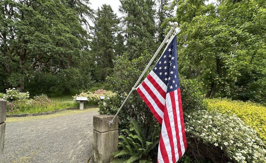 American flag outside cemetery.