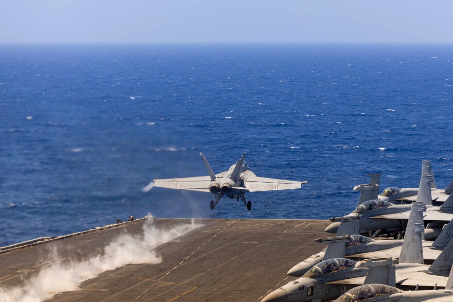 An F/A-18E launches from the flight deck of the aircraft carrier USS Harry S. Truman before its return to Norfolk.