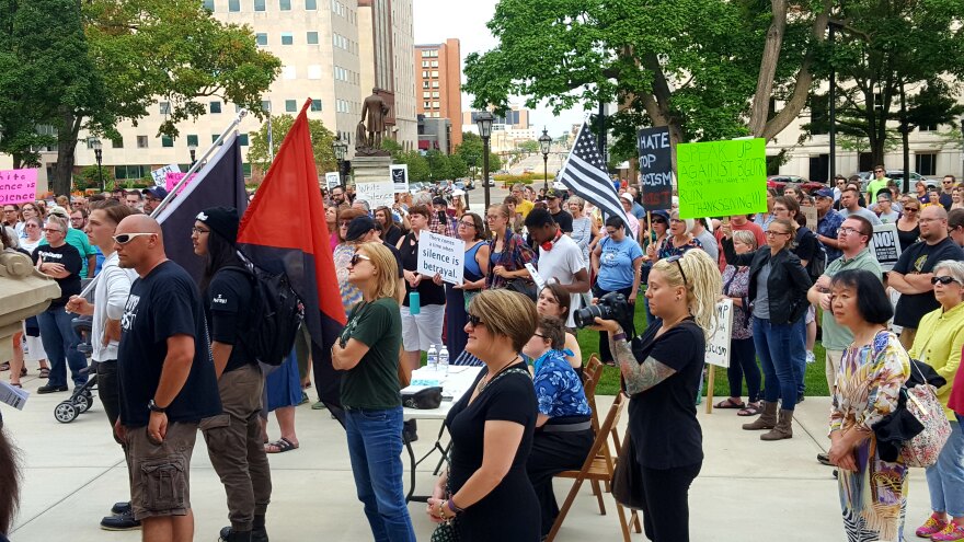 People at a peace vigil at State Capitol 