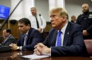 Former President Donald Trump sits in Manhattan Criminal Court, Thursday, May 30, 2024, in New York.
