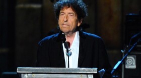 Bob Dylan accepts the 2015 MusiCares Person of the Year award. (Bucci/Invision/AP, File)