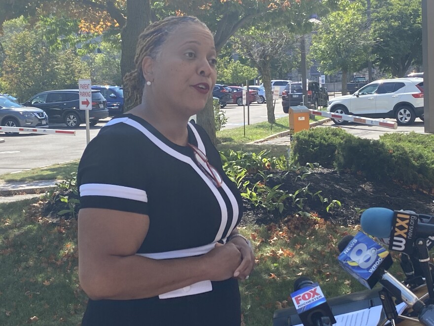 Rochester City School District Superintendent speaks outside of the Board of Education Friday.