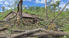 Downed trees cut off access to park buildings and roads.