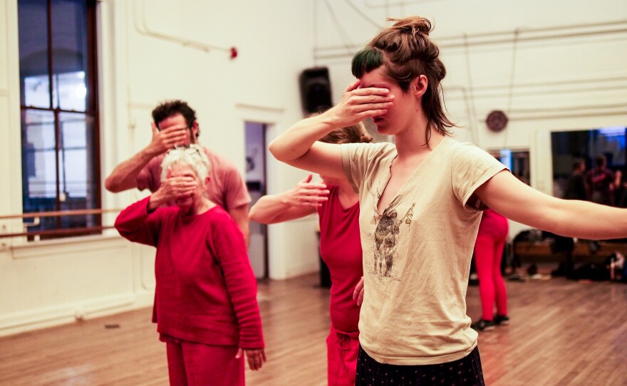 Western Massachusetts performers rehearse for Extinction Rebellion's Red Brigade, which is inspired by the UK performance and protest group of the same name.