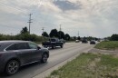 Westbound traffic on Hammond Road, toward the proposed site of the crossing over the Boardman River. (Photo: Ellie Katz/IPR News)