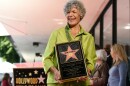 FILE - National Public Radio broadcast journalist Susan Stamberg holds up a replica of her new star on the Hollywood Walk of Fame following a ceremony, in Los Angeles, March 3, 2020. Stamberg, a ‘founding mother’ of NPR and the first female broadcaster to host a national news program, died Thursday, Oct. 16, 2025. She was 87. (AP Photo/Chris Pizzello, File)