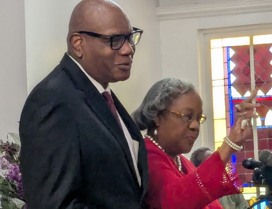 Pastor R.B.Holmes and Dr. Gloria Price Holmes address the crowd of well-wishers.