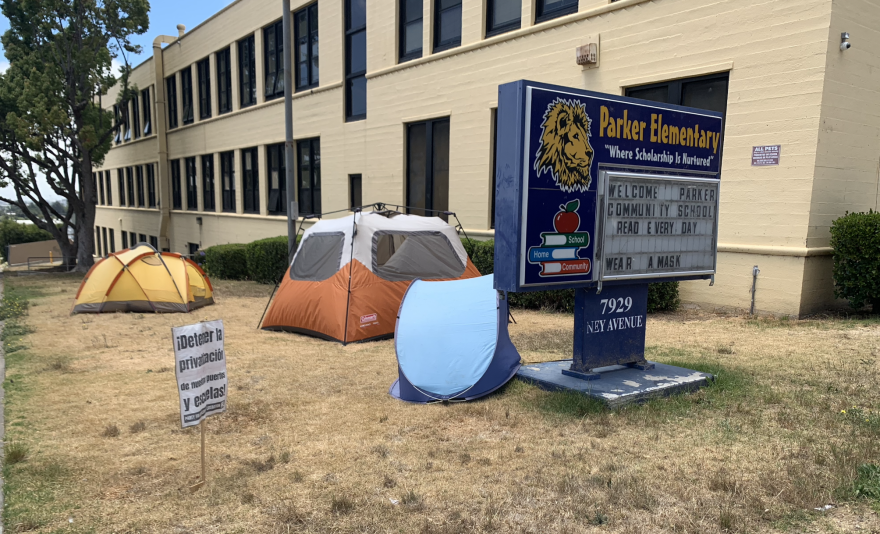 Parker Elementary's lawn, scattered with symbols of the sit-in.