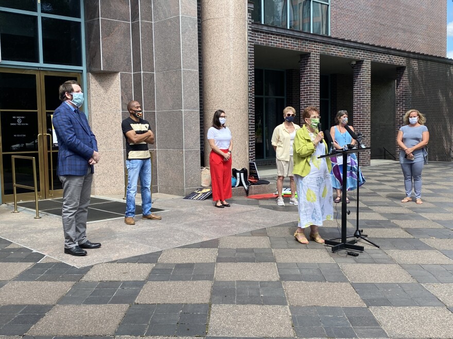 City Hall was the backdrop Wednesday afternoon for a coalition of city officials and heads of local advocacy groups criticizing local law enforcement. 