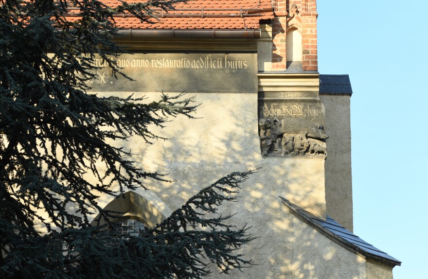 An anti-Semitic sculpture from the Middle Ages is displayed at a church in Wittenberg, Germany. Courts have ruled that it can remain, but a German Jewish man is determined to get it removed.