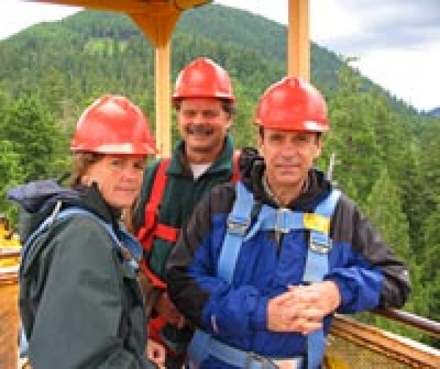 From left, Elizabeth Arnold, University of Washington ecologist David Shaw and U.S. Forest Service researcher Rick Meinzer, high above the forest in southwest Washington State.