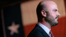 Former Paxton aide and DOJ official Aaron Reitz speaks with media following a debate hosted by the Republican Attorneys General Association (RAGA) at the Grenada Theater in Dallas on Feb. 17, 2026.
