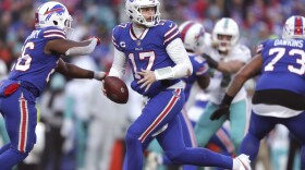 Buffalo Bills quarterback Josh Allen (17) runs a play during the second half of an NFL wild-card playoff football game against the Miami Dolphins, Sunday, Jan. 15, 2023, in Orchard Park, N.Y. (AP Photo/Joshua Bessex)