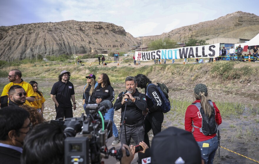  The Border Network for Human Rights hosted "Hugs Not Walls" an event that reunited families separated by immigration status. Hundreds of families in El Paso and Juarez waited to meet on a wood platform in the middle of a dry part of the Rio Grande. 