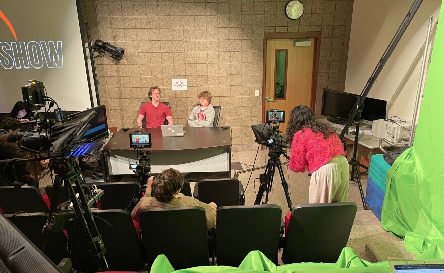 On-Desk Talent: Drew Murry and Christian Bedke; Camera Operator: Martina Cavieres; Floor Director/Camera Operator: Oona Tuttle.