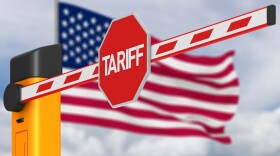 closed barrier with tariff sign