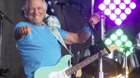 This July 29, 2016 file photo shows Jimmy Buffett performing on NBC's "Today" show in New York. Buffett, who popularized beach bum soft rock with the escapist Caribbean-flavored song "Margaritaville" and turned that celebration of loafing into an empire of restaurants, resorts and frozen concoctions, has died, Friday, Sept. 1, 2023.  (Photo by Charles Sykes/Invision/AP, File)