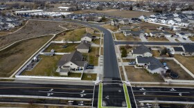 A drone shot of a city intersection.